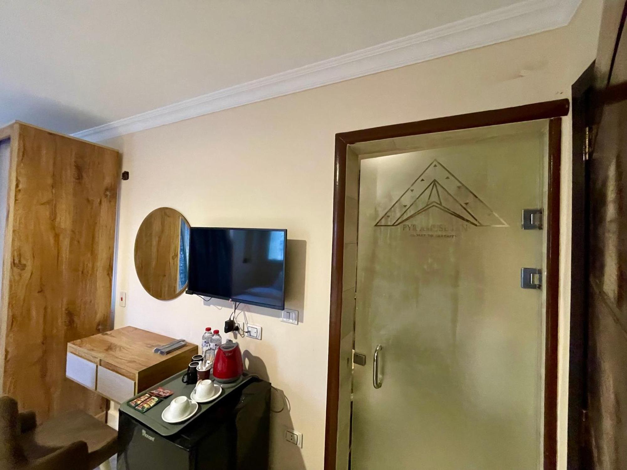 Pyramuse Inn Nazlet el Simman Bagian luar foto